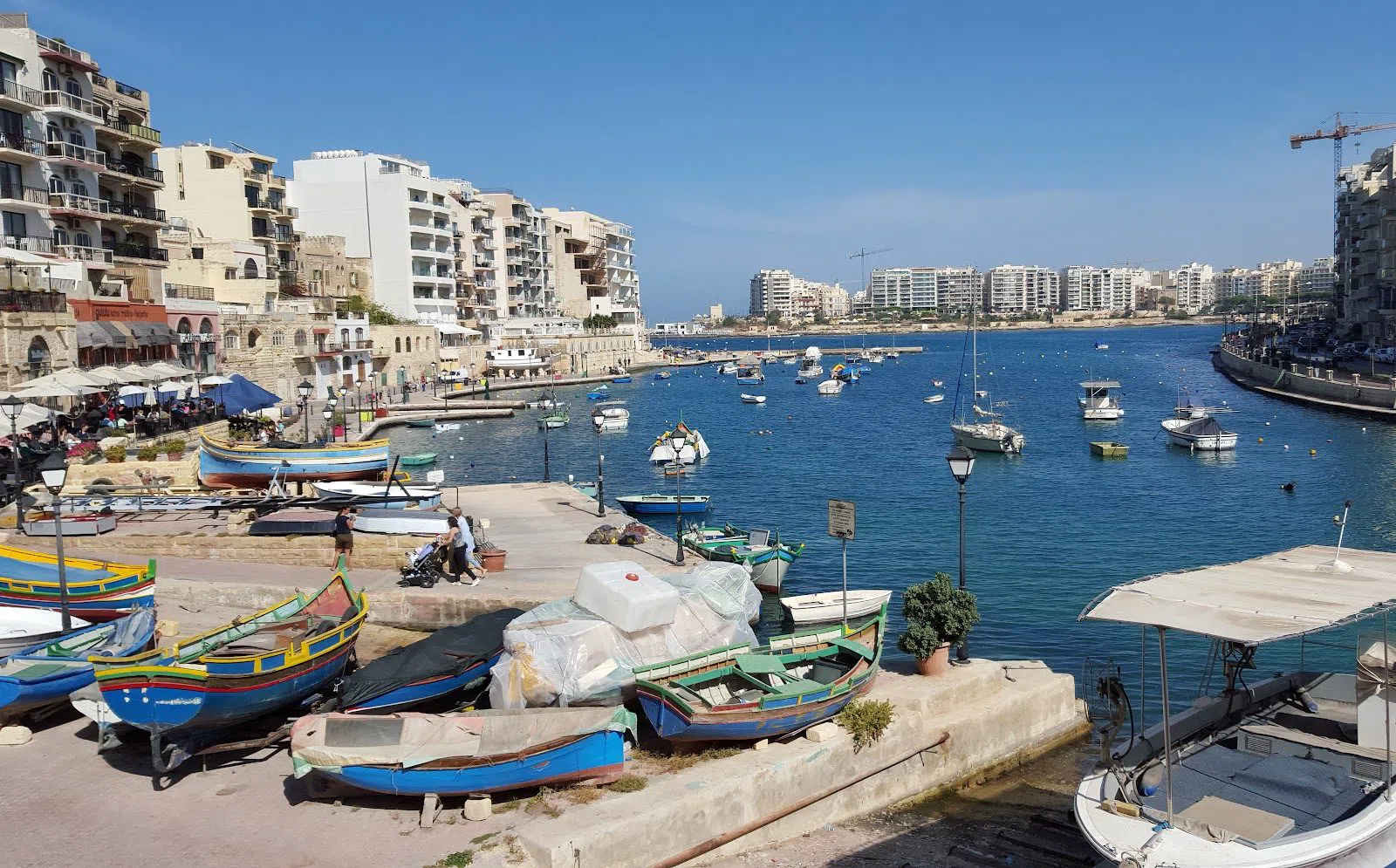 Walking the Qaliet waterfront in St Julian's